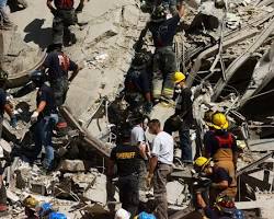 صورة rescue workers clearing debris