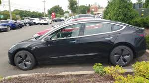 The model 3's center console has been redesigned. 2018 Black Tesla Model 3 Youtube