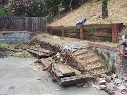 Removing Old Wood Retaining Wall Replacing With Mcnear Versa Lok Retaining Wall Www Allaccesslandscape Co Retaining Wall Real Estate Client Concrete Contractor