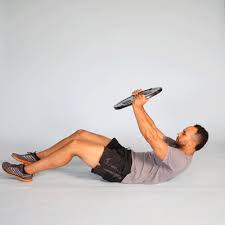 How do you improve your sit ups? Doing Weighted Situps For Your Abs Back Hips And Chest