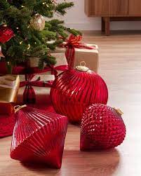 For a rustic display, stock up on ornaments in plaids, earthy tones, and organic textures. Giant Mercury Glass Christmas Ornaments Balsam Hill