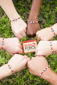 What Is Black And White And Red All Over The World The Original Red Black And White Rhino Force Bracelet Is Worn All Over The World To Show Support For Rhino Conservation Black And Red Bracelets Beautiful Hands