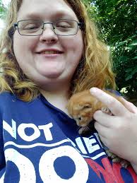 Spayed orange female barn cat available in Linn County Kansas