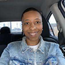 Small Gold and cream paisley pattern bedroom chair. Wheels