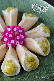 Qatayef With Cream Qataayif Qishta Leh Qatayef A La Creme قطايف بالقشطة Xawaash Com Atayef Recipe Ramadan Desserts Middle Eastern Desserts