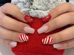 This nail art is the merry manicure inspo you've been looking for. Christmas Nail Art Ideas Holiday Nails Festive Nails Major Mag