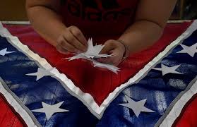 The flag is identical to the original confederate national flag raised on that date except that it has a map of alabama in the center of the circle of seven stars. In Alabama The Confederate Flag Is Still Made By A Team Of Latina Seamstresses The Washington Post