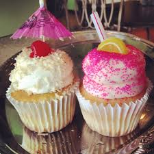 Pina Colada Left Pink Lemonade Right Cupcakes At Gigi S Cupcakes Nc Gigi S Cupcakes Food Baking