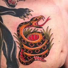 Gallery of tattoos done by artists in gadsden that you can filter by location, subject matter, style/technique, body part and size, and order by date or score. Traditional Snake Tattoo On Man Stomach