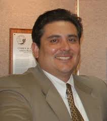 Rodela juggles two basketball coaching jobs