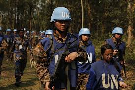 U.N. Peacekeepers from Mongolia patrol as part of a