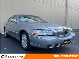 Image result for Light Ice Blue 2006 Town Car