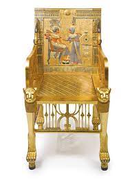 Tutankhamun S Throne An Egyptomania Carved Giltwood And Polychrome Decorated Throne Cairo Circa 1925 Egyptian Furniture Tutankhamun Furniture