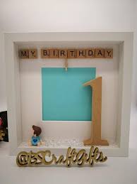 A bracelet, pendant or ring shaped like the birthday boy or girl's initials. Baby Photo Frame First Birthday Personalised 1st Birthday Etsy Boy First Birthday Gift Birthday Gifts For Girls First Birthdays