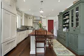 Moreover, this design involves farmhouse characteristics such as the rustic plate holder, reclaimed island table extension, and many flowery touches. The Top 89 Kitchen Cabinet Color Ideas