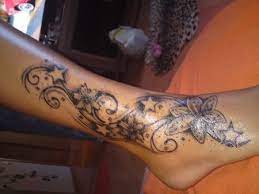 Tattoo rippen frau schmerzen tattoo arts. Sterni22 Sterne Blume Tattoo Sterne Blumen Fusstattoo Tattoo Sterne