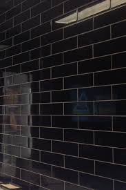 With the different hues of gray and off whites it can be paired with both warm tone tiles and cool tone tiles. Marble Tiles Black Grout Novocom Top