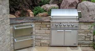 The drain runs into a dry well. Designing Outdoor Kitchens With Natural Stone Use Natural Stone