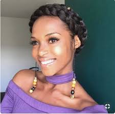 It's hard not to be swept up in bohemian mania. Beautiful Black Woman In A Purple Shirt With A Halo Braid Douglas J