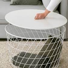 Each table is crafted from solid wood and features understated moldings, tapered legs and three drawers to house your remote, coasters and magazines. Kvistbro Storage Table White 61 Cm Ikea