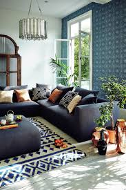 John Lewis Persia Wallpaper Slow Living Home Inspiration John Lewis Amp Partners Pers Copper Living Room Blue And Copper Living Room Feature Wall Living Room