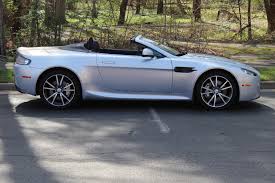 Image result for Lightning Silver 2011 Aston Martin