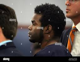 Jason Griffith, center, makes an appearance in District Court at the  Regional Justice Center in Las Vegas, Nev. Wednesday, Feb. 16, 2011.  Griffith, pleaded not guilty in the slaying and dismemberment of