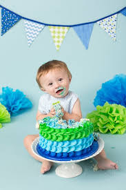 Meant for just the birthday boy or girl, these cakes are supposed to be smashed, eaten, crumbled, and otherwise destroyed by the child as part of the festivities or in a special photo shoot. Green And Blue Boy Smash Cake Boys 1st Birthday Cake Baby Boy Birthday Green Birthday Cakes