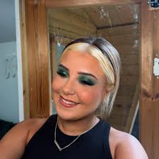 Makeup by Katie Burnham added a...