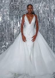 Wedding gowns from six black designers who have made their mark in an industry that has often left out people of color. Black Wedding Dress Designers Who Need To Be On Your Radar