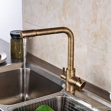 Kitchen faucets reliable and functional brass faucets, copper faucets. 2021 New Popular Retro Style Antique Brass Kitchen Faucet Two Waterout Long Swivel Spout Pure Water Purification Mixer From Gonglangno1 112 57 Dhgate Com