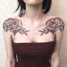 The sinuous lines of the dragon's body supported by scales and fangs take a front shoulder tattoo to the next. 30 Amazing Shoulders Peony Tattoos