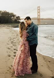 Photo Shoot In San Francisco Floral Maxi Dress Engagement Session Engagement Winter Engagement Photos Outfits Couple Photography Poses Engagement Photoshoot