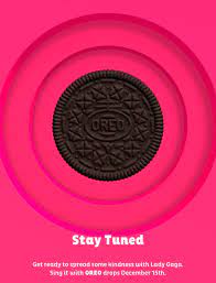 A pink golden oreo with green creme in the middle. Gaga Now On Twitter Oreo And Ladygaga Will Team Up For A New Initiative Sing It With Oreo Available From Dec 15th Https T Co Uwmaubi9fc Https T Co Znj3wg3qoz