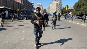 Taliban fighters stand guard in front of main gate leading to afghan presidential palace, in kabul, afghanistan, monday, aug. Iraq Twin Suicide Bombing Kills Dozens In Baghdad News Dw 21 01 2021