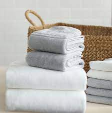 How To Care For Your Towels How To Fold Towels Towel Bathroom Storage Organization