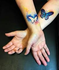 Mother Daughter Tattoo Butterfly Watercolor Cutout Wrist Tattoos In 2020 Tattoos For Daughters Mother Daughter Tattoos Mom Daughter Tattoos