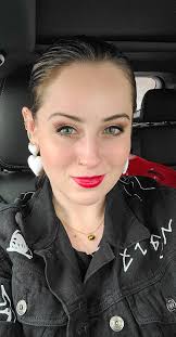 Baseball earrings repurposed into a necklace