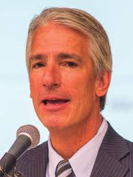 Axelrod to students: “Steer us to a better place.”