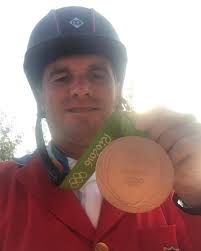 Phillip takes a mandatory selfie with his new hardware, and we get an  up-close look at the Rio 2016 Olympic Ribbon