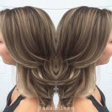 Beach blonde highlights are sprinkled lightly throughout the top portion of the hair in this easy hairstyle. 50 Light Brown Hair Color Ideas With Highlights And Lowlights
