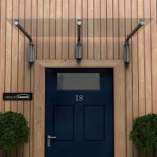 Stainless steel finish with glass canopy. Glass Door Canopy With Tubular Stainless Steel Brackets Type M