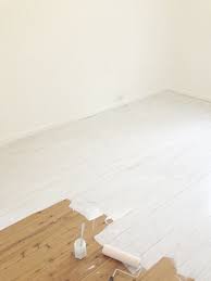 When he felt the ground shake and saw plumes of dust and debris. Beach Cottage In Chaos Painting Floors Life By The Sea Painted Wood Floors White Floorboards White Wood Floors