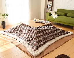 炬燵orこたつ) is a low, wooden table frame covered by a futon, or heavy blanket, upon which a table top sits. Free Shipping 2pcs Set Kotatsu Futon Carpet Square Patchwork Style Cotton Soft Quilt Japanese Kotatsu Suit For 60 75 Table Throw Aliexpress