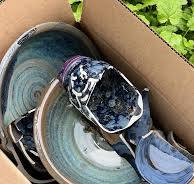 Turquoise pottery with intricate details and vibrant colors