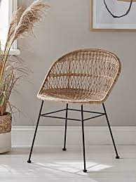 Just set the table and enjoy your tropical dining environment! Rounded Wicker Dining Chair