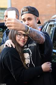 Image result for Justin Bieber hugs fans during wine filled vineyard visit