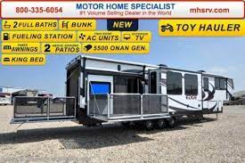 Turn your ramp into a deck. Ohl10999002 2016 Heartland Rv Edge 397ed Toy Hauler Bath 1 2 Side Patio 2 A C For Sale In Alvar Toy Hauler Fifth Wheel Toy Haulers Toy Haulers For Sale