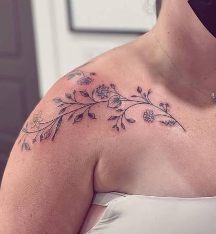 A delicate vine wrapping the shoulder and collarbone with important birth month florals sprinkled in along with just a touch of colour! Such a fun piece to do, thanks so much for