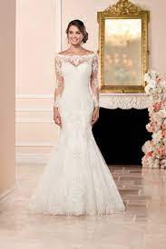 Style 6353 This Satin Fit Flare Long Sleeve Wedding Dress From Stella York Features An Wedding Dress Long Sleeve Wedding Dresses 2017 Trend Wedding Dresses